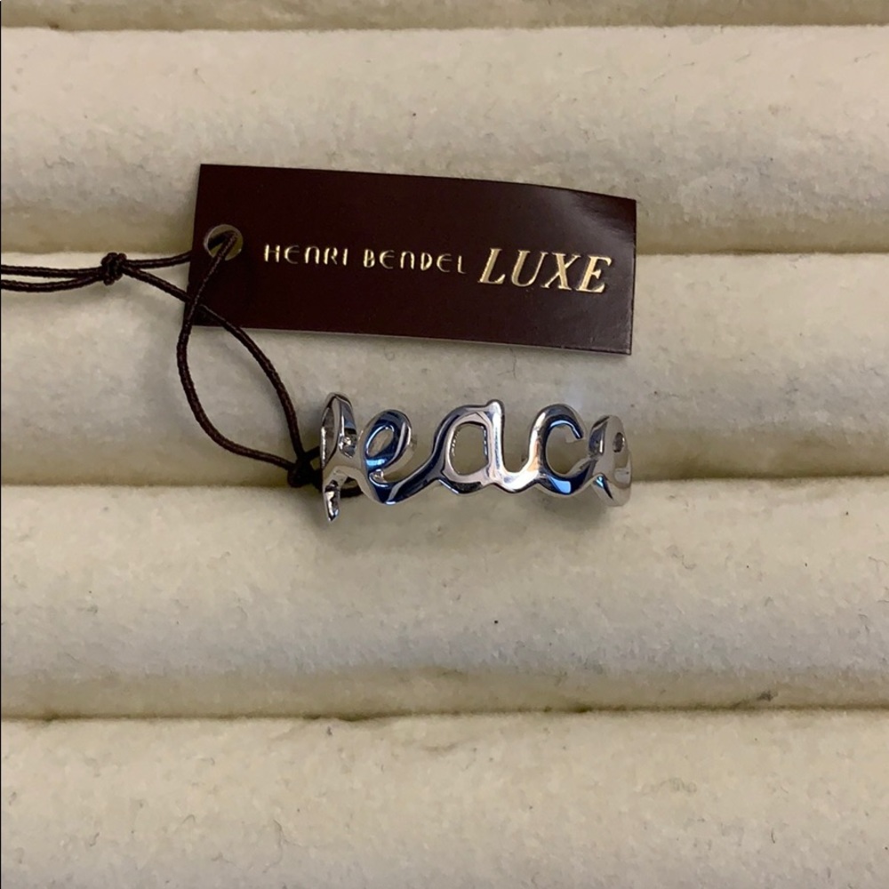 NWT Henri Bendel Peace Band Ring- Silver size 6